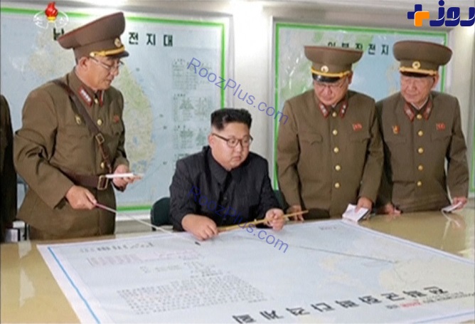 نقشۀ موشک باران جزیره گوام روی میز رهبر کره شمالی! +تصاویر