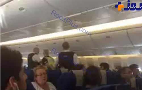 تصاویر:اقدام خطرناک یک مسافر در حین پرواز هواپیما
