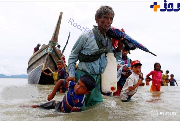 عکسی دردناک از فرار پدر و پسر روهینگیایی از میانمار