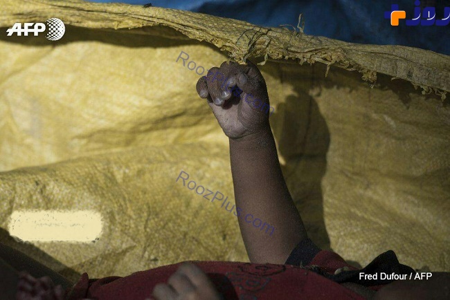 عکسی دردناک از کودک کشته شده قایق مهاجران روهینجایی