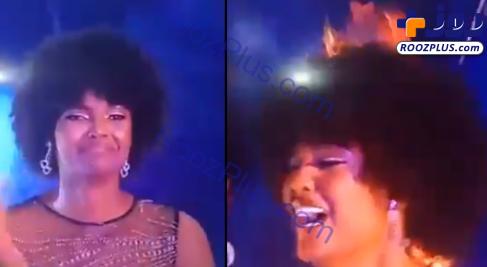 عکس/ آتش گرفتن موهای ملکه زیبایی آفریقا در حین مراسم!