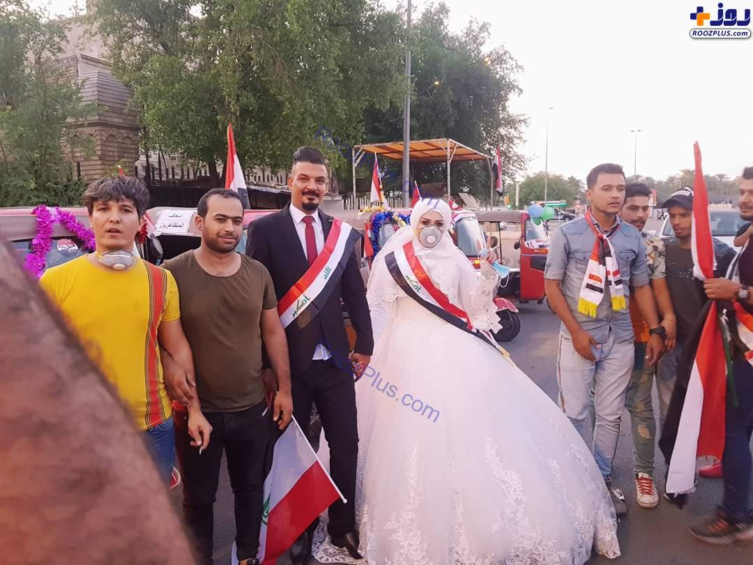 عکس/عروس و داماد عراقی در میدان التحریر بغداد