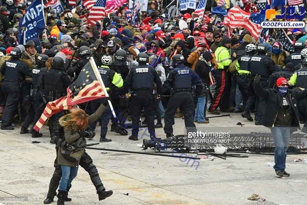 درگیری پلیس آمریکا با یک زن معترض +عکس