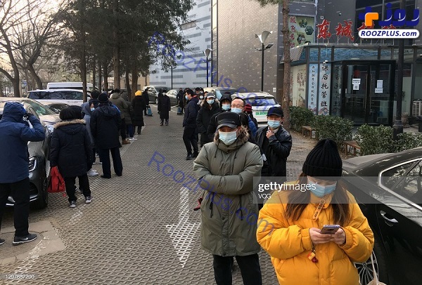 صف چینی ها برای تست کرونا در خیابان +عکس