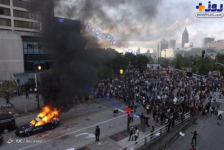 حمله معترضان به دفتر CNN در آتلانتا + عکس