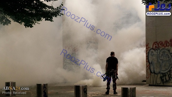 حمله پلیس آمریکا با گاز اشک آور به معترضان در پورتلند +عکس