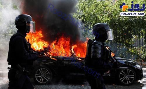 عکس/خودروی آتش گرفته در تظاهرات پاریس