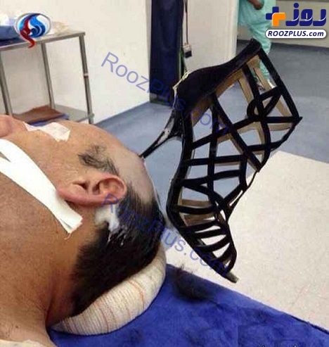 گیر کردن پاشنه کفش زنانه در سر شوهر بدشانس!+عکس