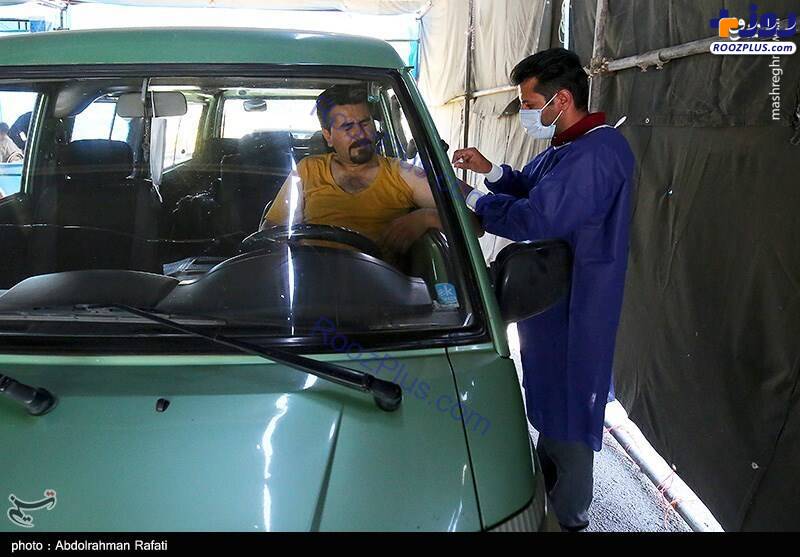 اولین پایگاه خودرویی واکسیناسیون کرونا در همدان /عکس
