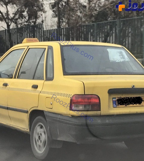حاج قاسم در يك تاكسي در تهران +عكس