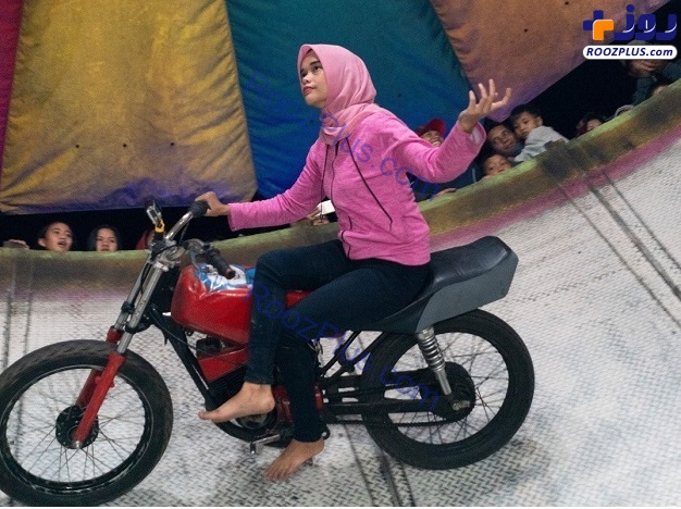 موتورسواری دختر محجبه+عکس